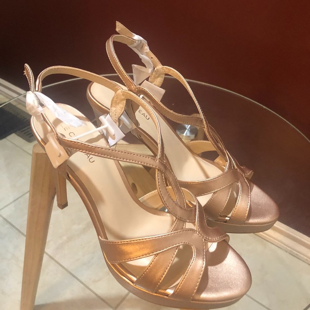 Brand new Le chateau golden  wedding heels .